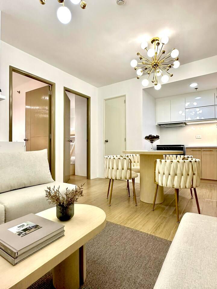 Living and dining detail in a Kubo Stays property